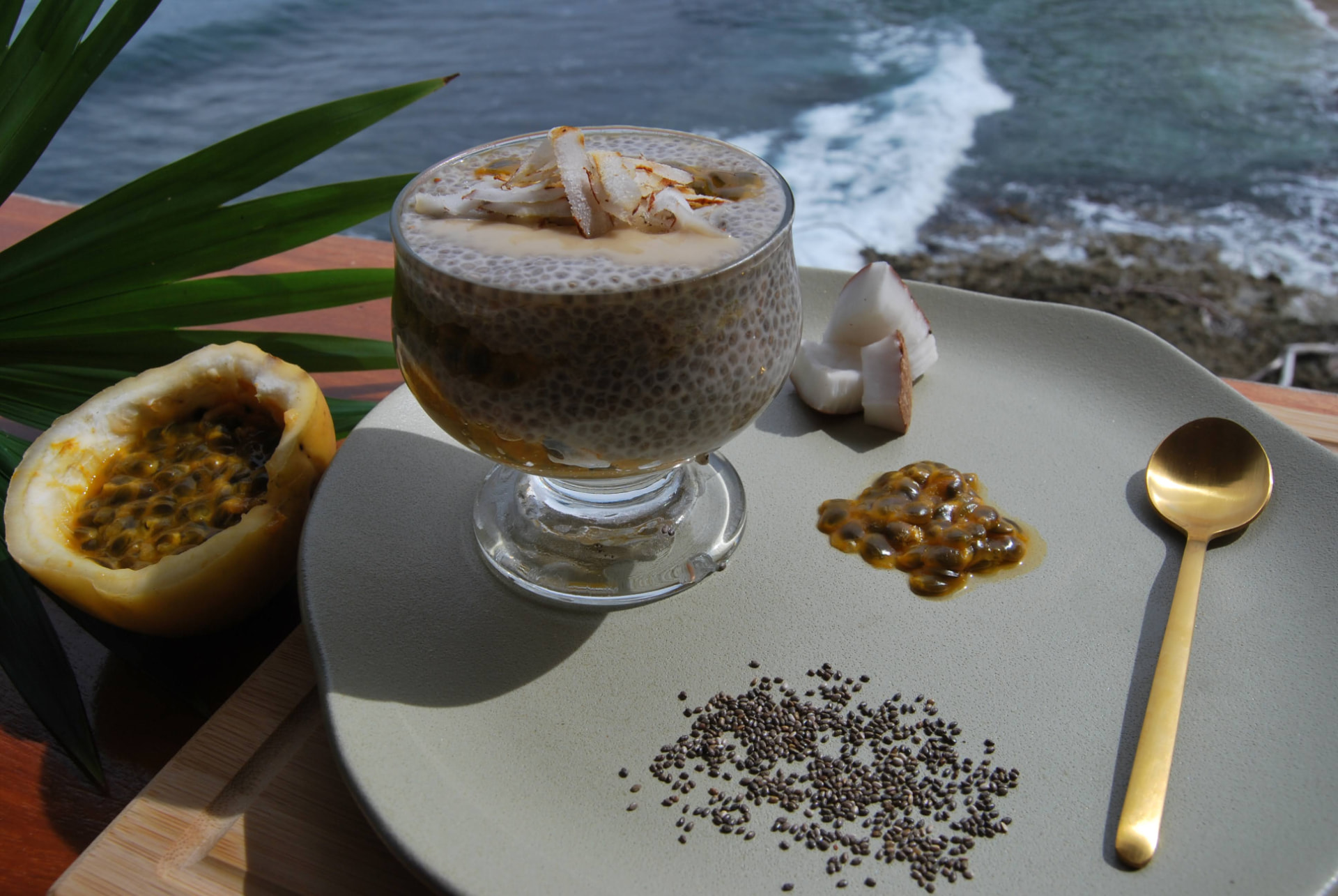 Chia pudding with passion fruit and coconut by the sea